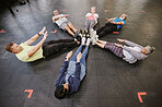 Gym, fitness workout and group doing exercise for abdomen together in a health training class. Studio floor, stretching and sport of athlete group and friends with cardio, target goals and challenge