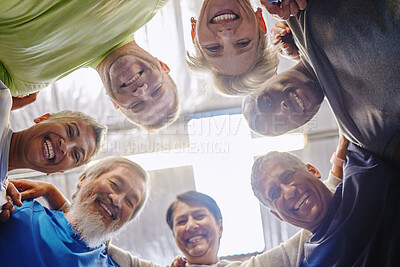 Buy stock photo Senior exercise group, teamwork circle and low angle portrait with smile, diversity and support for health. Elderly fitness, team building and solidarity for happiness, hug or motivation for wellness
