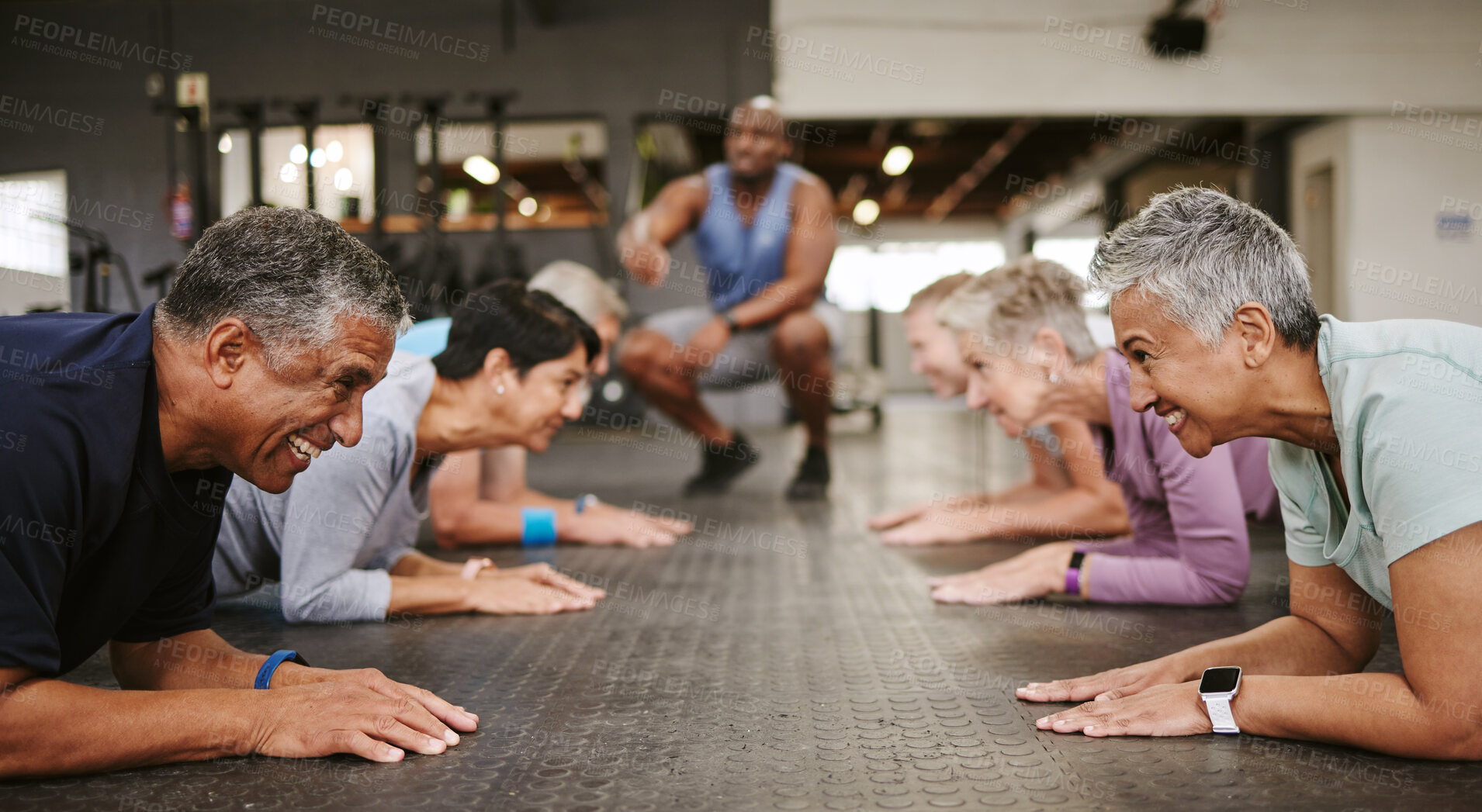 Buy stock photo Senior people, fitness and plank with personal trainer in class for workout, core exercise or training at gym. Elderly group in coaching ab session for strong abdominal muscles on gymnasium floor