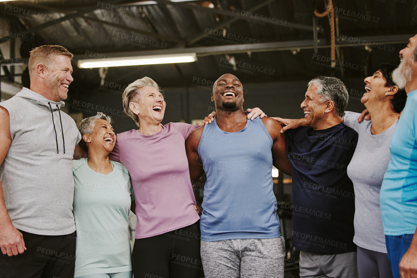 Buy stock photo Senior workout group, laugh and personal trainer, smile or support for wellness goal. Elderly women, team building and happy at gym for friends, solidarity and diversity for teamwork motivation hug