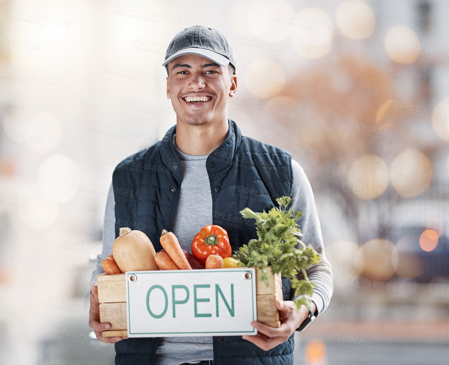 Buy stock photo Vegetables, open sign and man portrait for market, small business and food supplier in agriculture industry. Happy entrepreneur or seller with box of healthy product box on urban street for startup