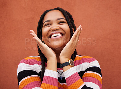 Buy stock photo Happy, laugh and freedom with a black woman on an orange background outdoor for joy or humor. Funny, laughter and smile with an african american person laughing or joking against a color wall