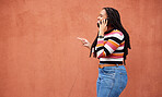 Happy black woman, phone call and smile on wall background with happiness, conversation and mockup space. African female talking on mobile, color mock up and smartphone communication with technology 