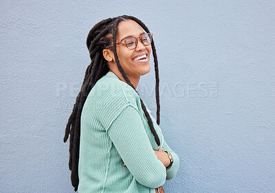 Buy stock photo Happy, proud and black woman with mockup in studio for advertising, space and joy on grey background. Happiness, smile and girl relax on wall, laugh and excited with product placement or copy space