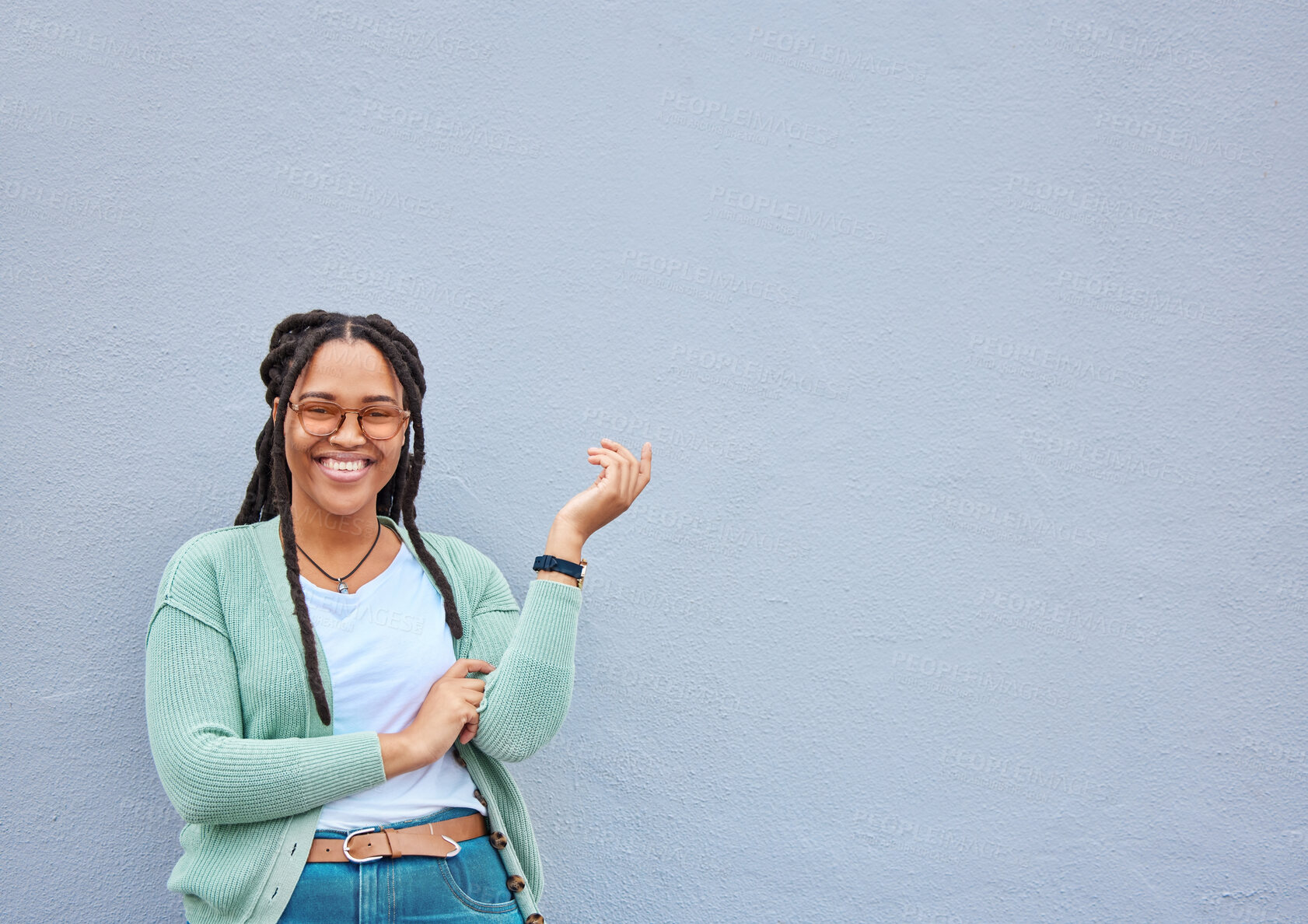 Buy stock photo Mockup, portrait and black woman pointing to space for advertising, empty or grey wall background. Face, gesture and girl relax, happy and smile in studio on product placement, isolated or copy space
