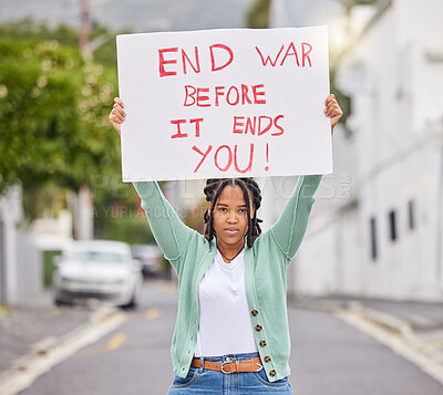 Buy stock photo War protest, poster and city woman rally to stop Ukraine conflict, human rights support or global violence. Black student banner, street portrait or social justice warrior fight for government change