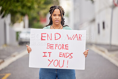 Buy stock photo War protest, portrait and poster woman rally to stop Ukraine conflict, human rights support or global violence. Black student banner, city street or social justice warrior fight for government change