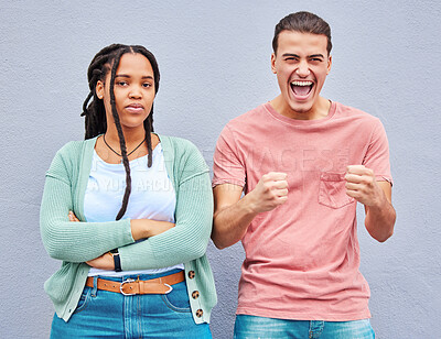 Bored, excited and portrait of an interracial couple with arms crossed, anger and happy about a win. Sad, smile and young man and woman looking angry, comic and mad about losing in a competition