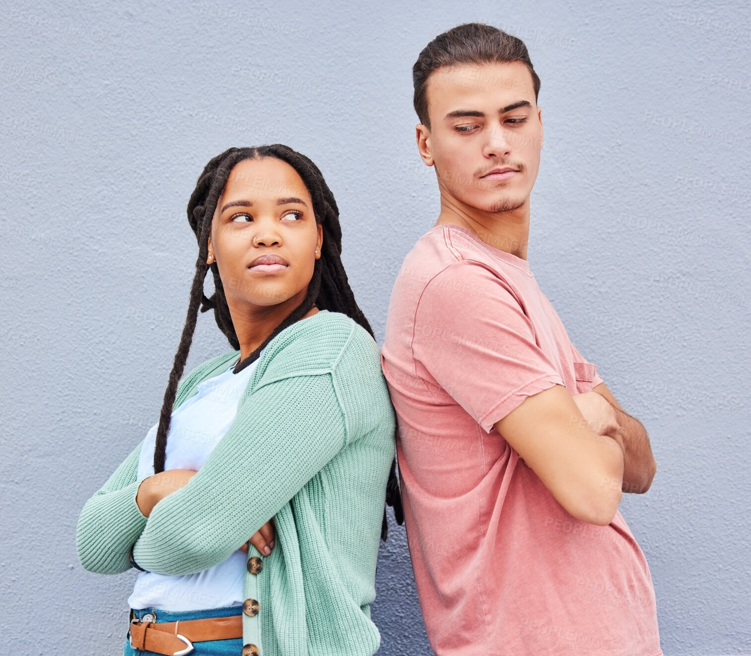 Buy stock photo Disagreement, mad and angry with interracial couple and wall background for fight, problem and argument. Ignore, upset and conflict with man and black woman for difficult, disappointed and breakup