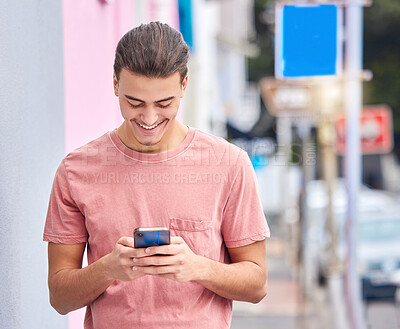 Buy stock photo Man, cellphone and typing in city for social media, technology and iot networking. Happy young guy walking in urban street with smartphone, connection and reading notification of online internet post