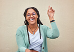 Hand, sign and woman with mockup in studio for advertising, questions and space on wall background. Face, direction and hand gesture by happy, smile and cheerful girl showing product placement offer