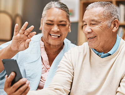 Buy stock photo Video call, wave or happy old couple talking, communication or speaking in conversation in retirement. Partnership, elderly man or senior woman greeting online on phone at home together with smile