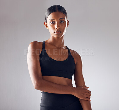 Buy stock photo Portrait, fitness and beauty woman isolated on studio background for health, wellness and training mockup. Confident indian person, athlete or model with sports fashion, workout and exercise for body