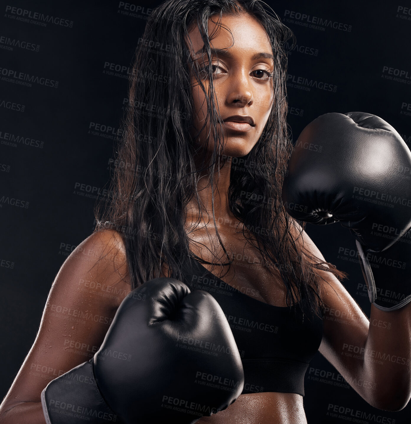 Buy stock photo Boxer, gloves and portrait of woman on black background for sports, strong focus or mma training. Female boxing, workout or fist fight of impact, energy and warrior power for studio fitness challenge