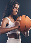 Basketball player, sports exercise and studio woman for wellness challenge, practice game or fitness competition. Health performance, training workout and athlete model isolated on dark background
