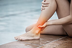 Pool, fitness and athlete with an ankle pain, injury or accident after water sport training or exercise. Sports, swim and woman swimmer with leg sprain, medical emergency or torn muscle after workout