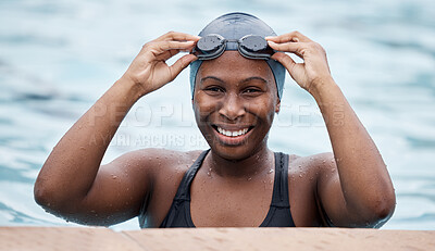 Buy stock photo Training, portrait or happy black woman in swimming pool or water for practice, workout or body fitness. Wellness, smile or healthy girl swimmer in goggles exercising for cardio endurance or exercise