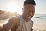 Selfie, beach and fitness with a sports black man outdoor during summer for a cardio or endurance workout. Portrait, nature and exercise with a male runner or athlete training outside for health