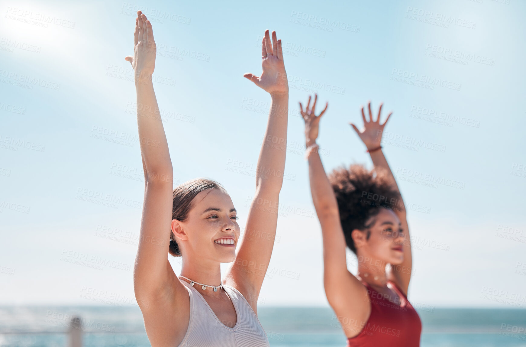 Buy stock photo Yoga, zen and beach with woman friends outdoor together in nature for wellness training. Exercise, chakra or fitness with a female yogi and friend outside for a mental health workout by the ocean