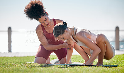 Yoga class, personal trainer or women support, helping and learning balance, training and exercise on beach or park. Coaching black woman with pilates workout on grass for sports and body wellness