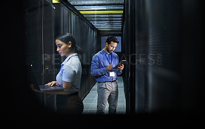 Buy stock photo Man, woman or technology in server room, IT engineering or software programming for cybersecurity, analytics or database safety. Data center, programmer or coding developer on cloud, laptop or tablet