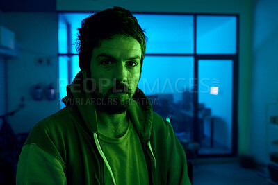 Buy stock photo Man, portrait and criminal in dark neon garage with cybersecurity vision, software programming thinking or phishing. Hacker, face and night clothes for secret virus ideas of fraud scam or innovation