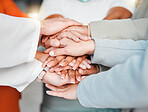 Team, hands together and collaboration in trust or unity for coordination or corporate goals at the office. Hand of group in teamwork celebration for partnership, agreement or community support