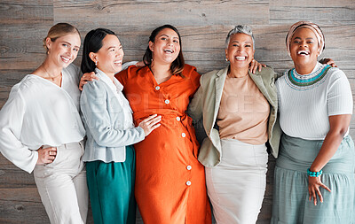 Buy stock photo Happy, smile and portrait of a pregnant woman with her friends by a wood wall at her baby shower. Friendship, diversity and females supporting, loving and bonding with a lady with pregnancy together.