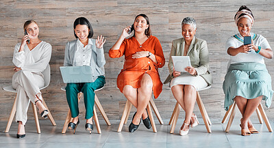 Buy stock photo Diversity, women and waiting with devices, happiness and business with confidence, recruitment and job interview. Multiracial, female employees and staff with teamwork, digital connection and typing