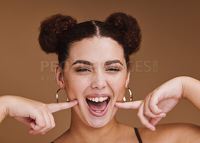 Buy stock photo Woman, portrait or fun cheek fingers on isolated brown background for self love, goofy or silly facial expression. Smile, happy or beauty model with fashion hairstyle makeup cosmetics or emoji face