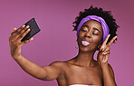 Phone, selfie and face of black woman with peace sign for wellness, fashion and cosmetics on purple background. Beauty, skincare and girl influencer on smartphone for social media, picture and post