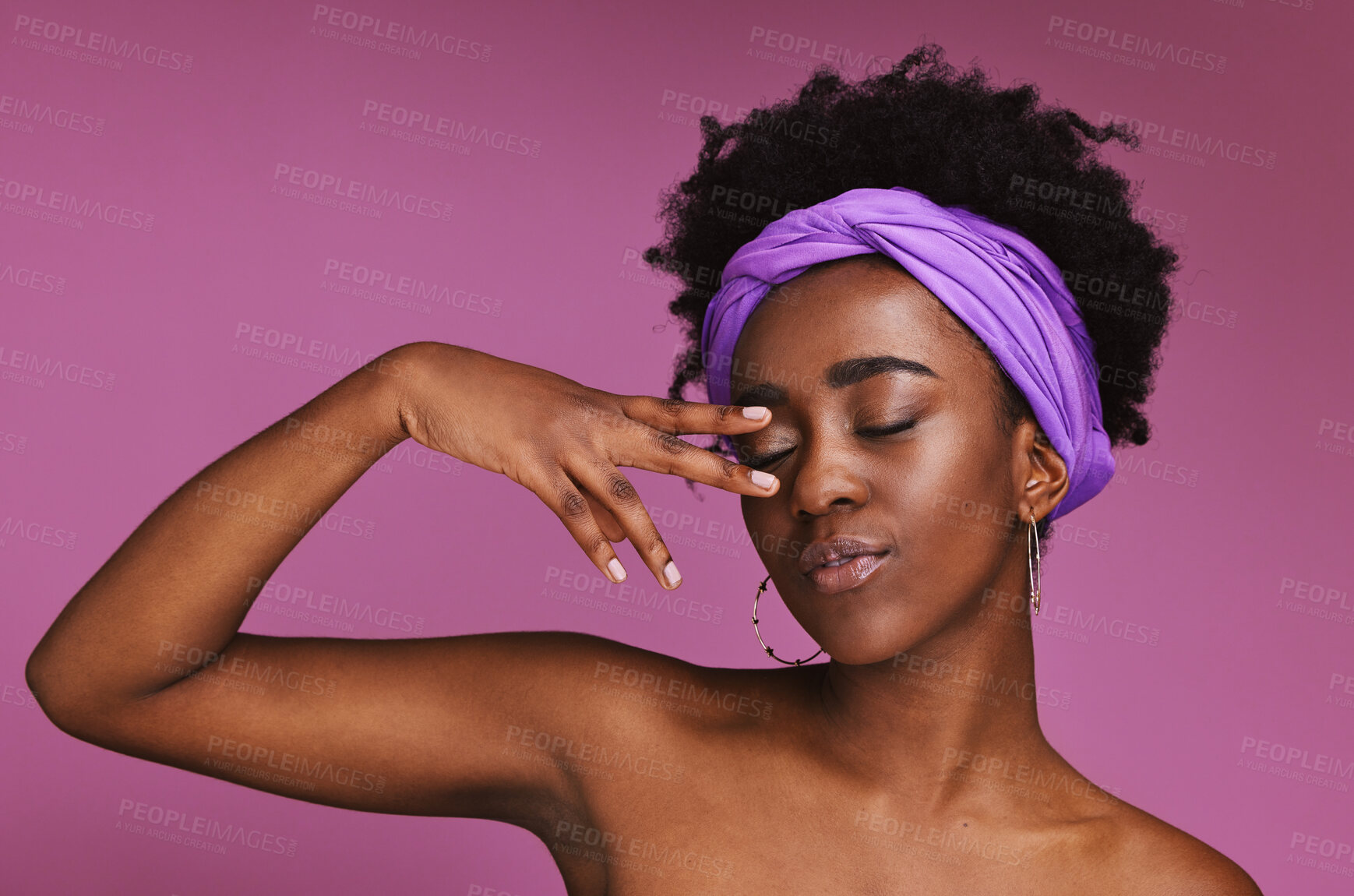 Buy stock photo Face, beauty and skincare with a model black woman on a pink background in studio for natural care. Hand, hair and headband with an attractive young female posing to promote cosmetic treatment