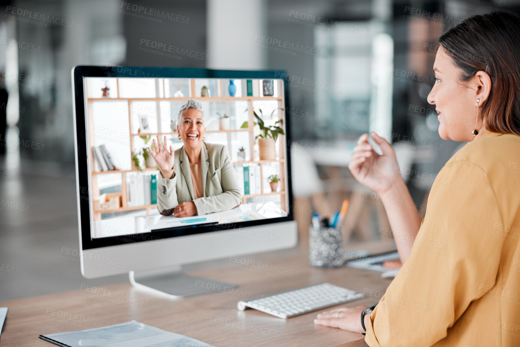 Buy stock photo Video call, computer and business women wave in office, talking and chatting in virtual chat. Technology, communication and employees or people waving in online meeting, webinar or digital discussion