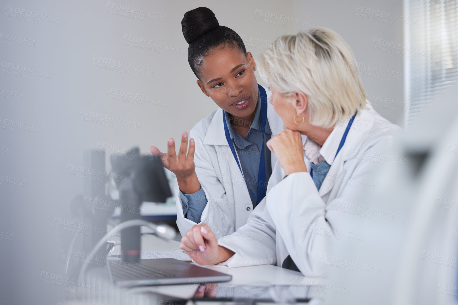 Buy stock photo Teamwork, collaboration and doctors with laptop in laboratory for medical research or science. Computer, lab assistant or researchers, black woman and senior female, talking or discussing information