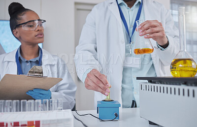 Buy stock photo Science, laboratory and team with liquid in test tube for medical research, study and vaccine development. Biotechnology, pharmaceutical and scientists with sample for analysis, test and experiment