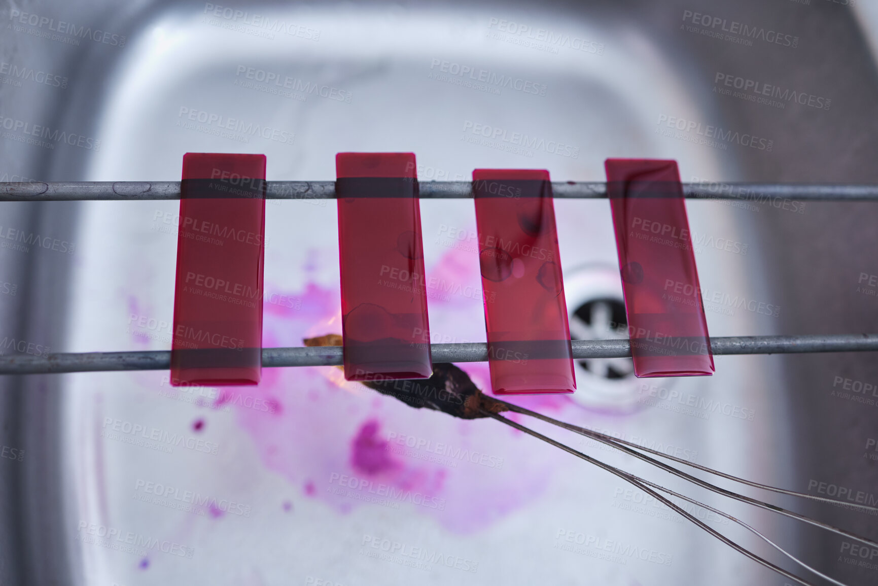 Buy stock photo Red, blood and glass slide in laboratory stain research, dna cell engineering or acid particles chemistry in top view sink. Zoom, science and healthcare dye study in medical pharmacy with cotton swab