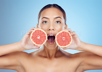 Buy stock photo Pomegranate beauty, surprise woman and portrait for skincare, detox wellness and studio background. Model face, healthy red fruits and natural diet for facial nutrition, aesthetic dermatology and wow