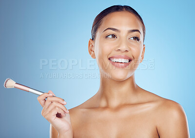 Buy stock photo Makeup brush, smile and black woman with cosmetics, skincare and wellness tool. Blue background, studio and model with cosmetic application tools for dermatology, self love and beauty skin glow