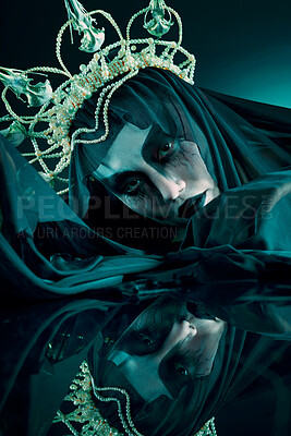 Buy stock photo Reflection, dark and fantasy with portrait of queen for evil makeup, fashion and horror art. Creative, mystery and black fabric with woman and crown for spooky, elegant and nightmare veil in studio