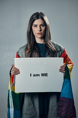 Buy stock photo Woman, protest and poster in pride for gay, LGBTQ equality or human rights against gray studio background. Portrait of confident female activist with I am me message board for sexuality empowerment