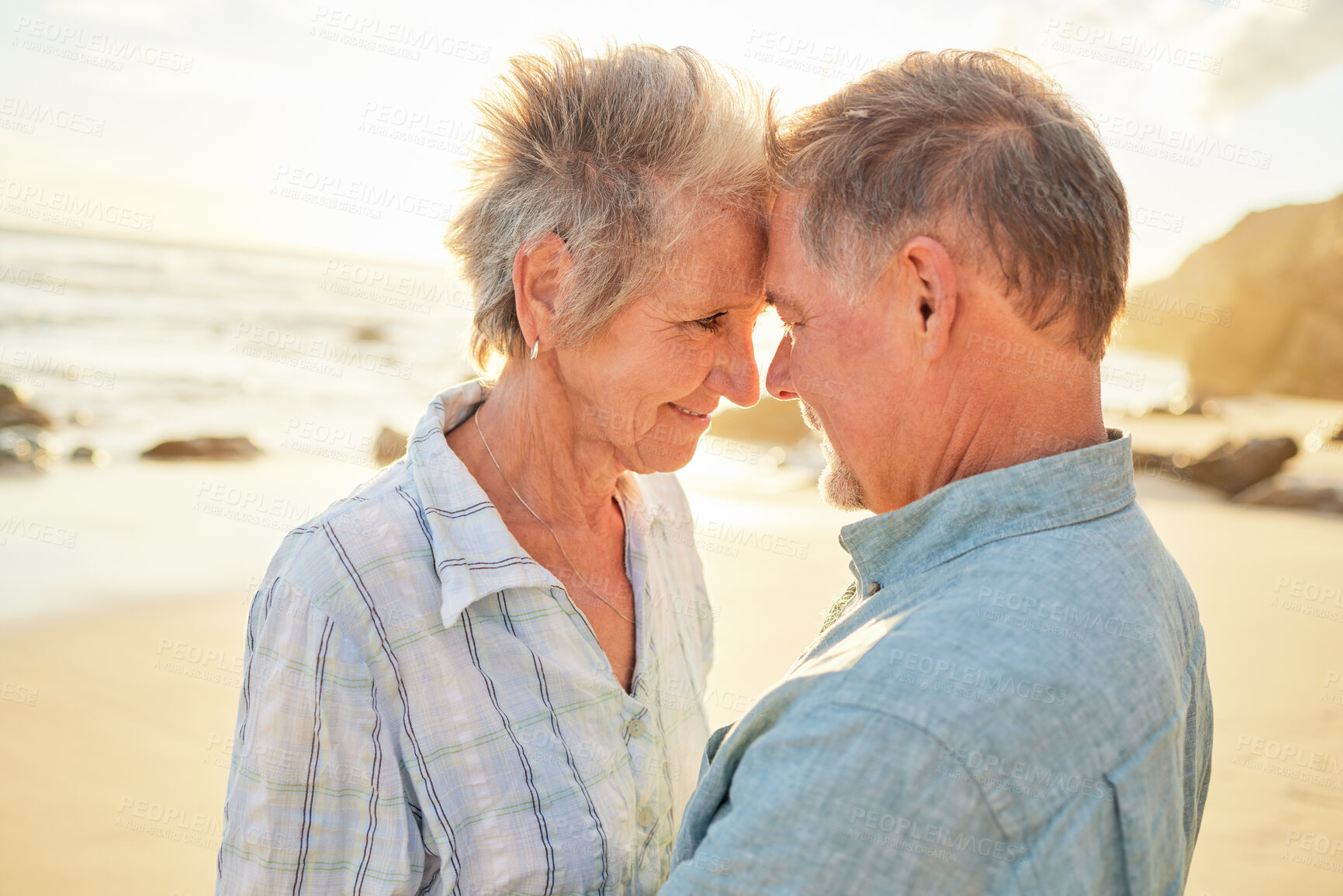 Buy stock photo Beach, senior couple and love of people with care, smile and marriage by the ocean. Retirement, summer holiday and sea vacation of a man and woman together feeling love and support in nature on sand