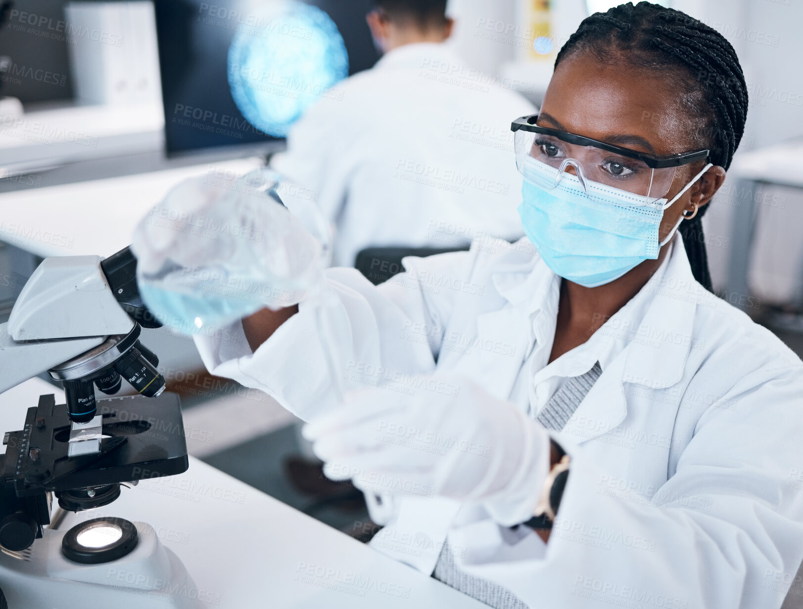 Buy stock photo Science, covid and reaction with a black woman doctor working in a laboratory for research or innovation. Medical, analytics and development with a female scientist at work in a lab for chemistry