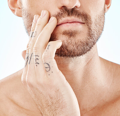 Buy stock photo Beard, zoom and hand of a man for skincare isolated on a white background in a studio. Wellness, beauty and face of a model with facial hair, cosmetic care and glow from dermatology on a backdrop