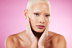 Portrait, skin and makeup with a model black woman in studio on a pink background for edgy cosmetics. Face, skincare or natural with a unique and attractve young female indoor for cosmetic care