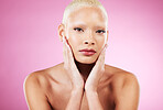 Portrait, skincare and makeup with a model black woman in studio on a pink background for edgy cosmetics. Face, beauty or natural with a unique and attractve young female indoor for cosmetic care