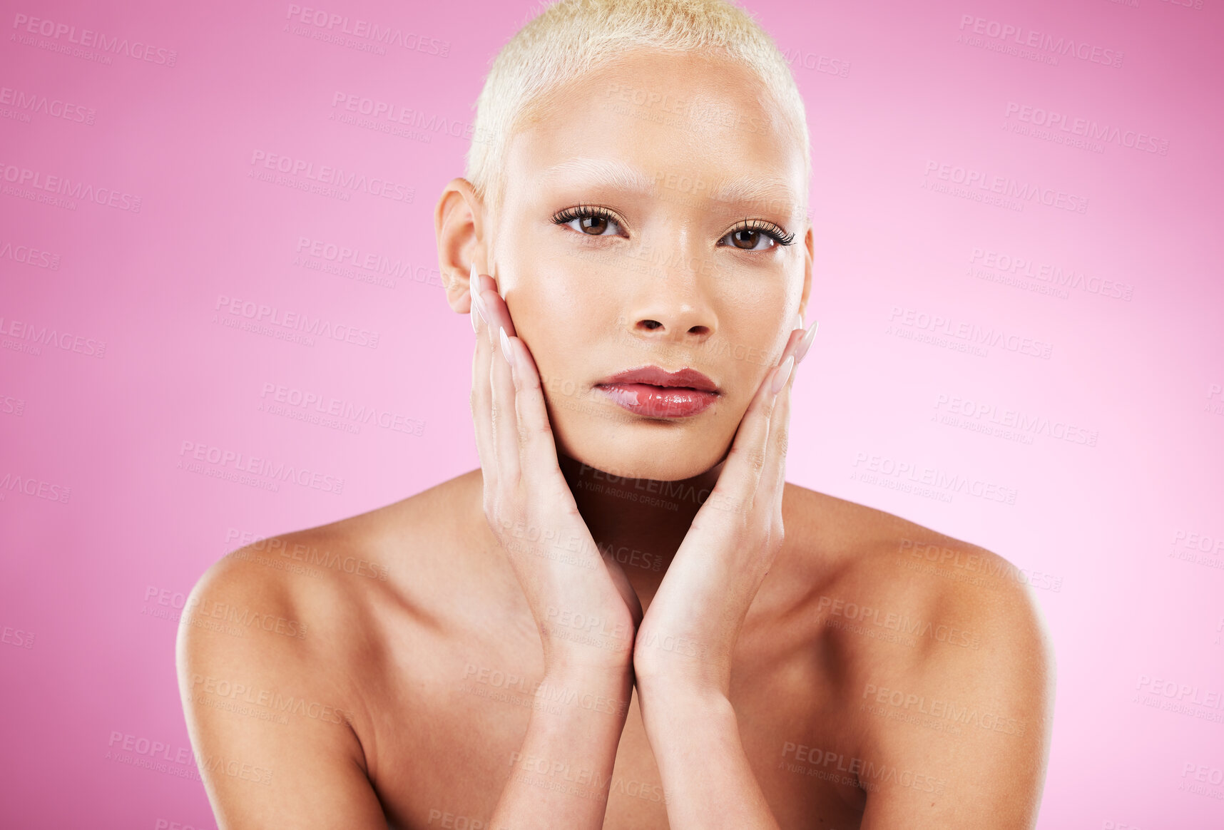 Buy stock photo Portrait, skincare and makeup with a model black woman in studio on a pink background for edgy cosmetics. Face, beauty or natural with a unique and attractve young female indoor for cosmetic care