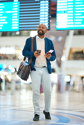 Buy stock photo Black man with phone, airport and flight schedule, walking in terminal, holding ticket and passport for business trip. Smile, travel and happy businessman checking international destination online.