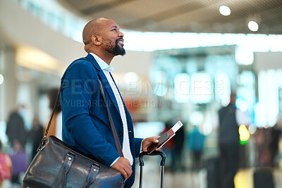 Buy stock photo Passport, flight and businessman standing in the airport checking the departure times or schedule. Travel, work trip and professional African male waiting by terminal with his ticket to board plane.