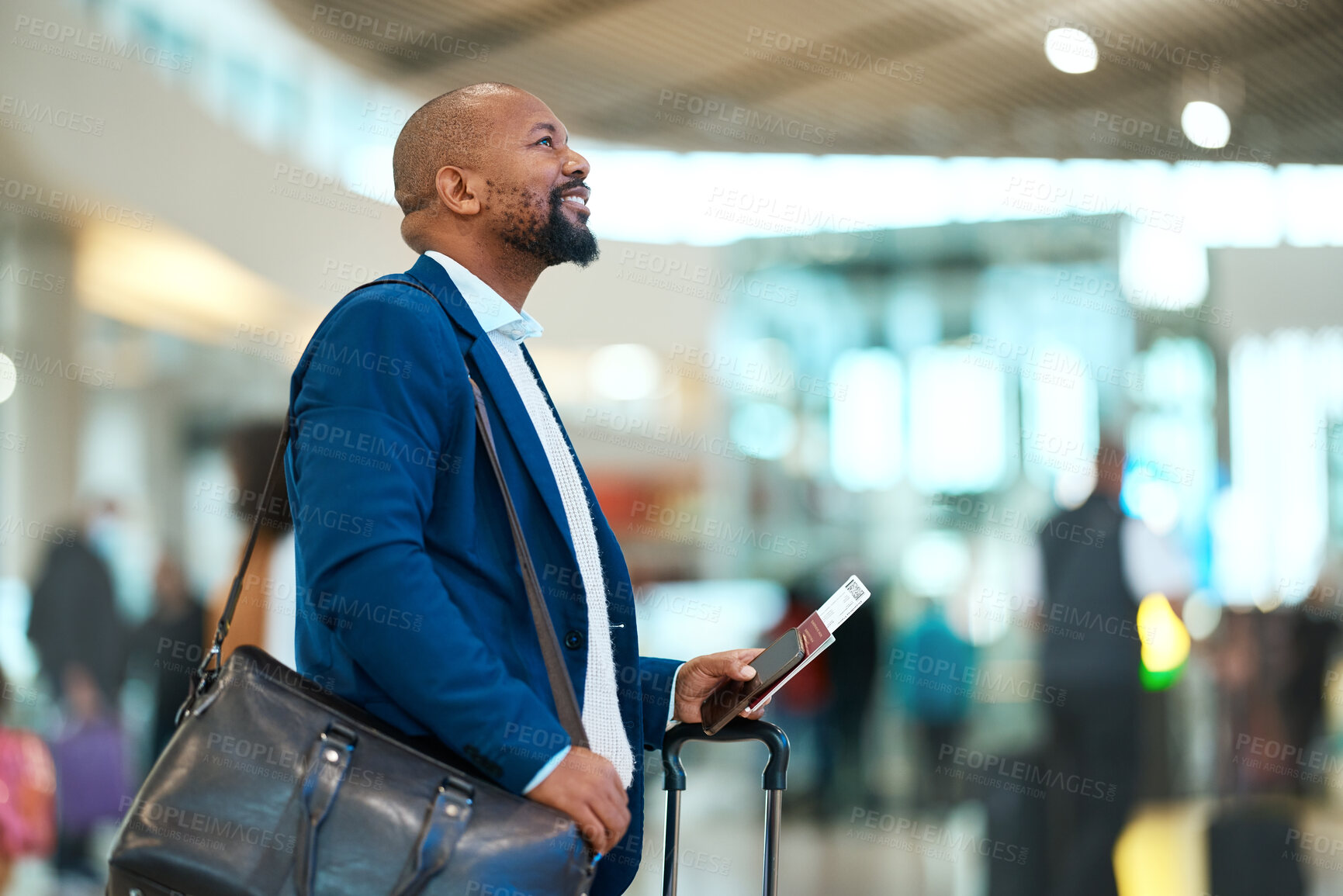 Buy stock photo Passport, flight and businessman standing in the airport checking the departure times or schedule. Travel, work trip and professional African male waiting by terminal with his ticket to board plane.