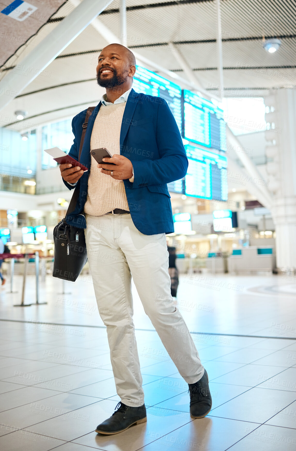 Buy stock photo Black man walking in airport with phone and ticket, checking flight schedule in terminal and holding passport for business trip. Smile, travel and happy businessman boarding international destination